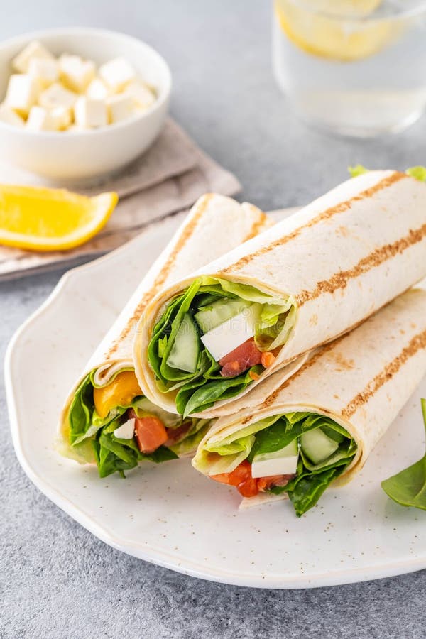 Wrap Sandwich, Roll with Fish Salmon, Vegetables and Cheese. Grey