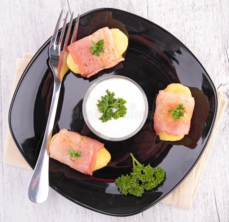 Wrapped bacon appetizer stock photo. Image of meat, sauce 30879712