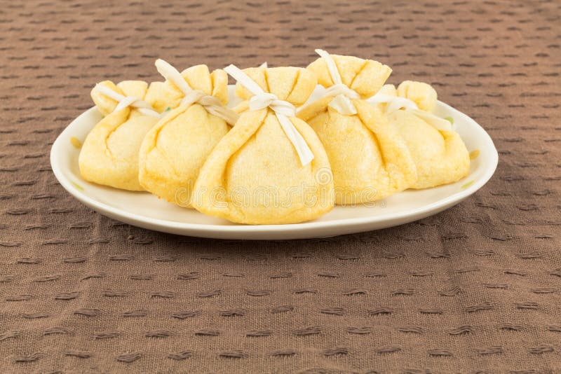 Wrapped Tofu Pouch Poundedrice Cake on Dish Stock Photo Image of