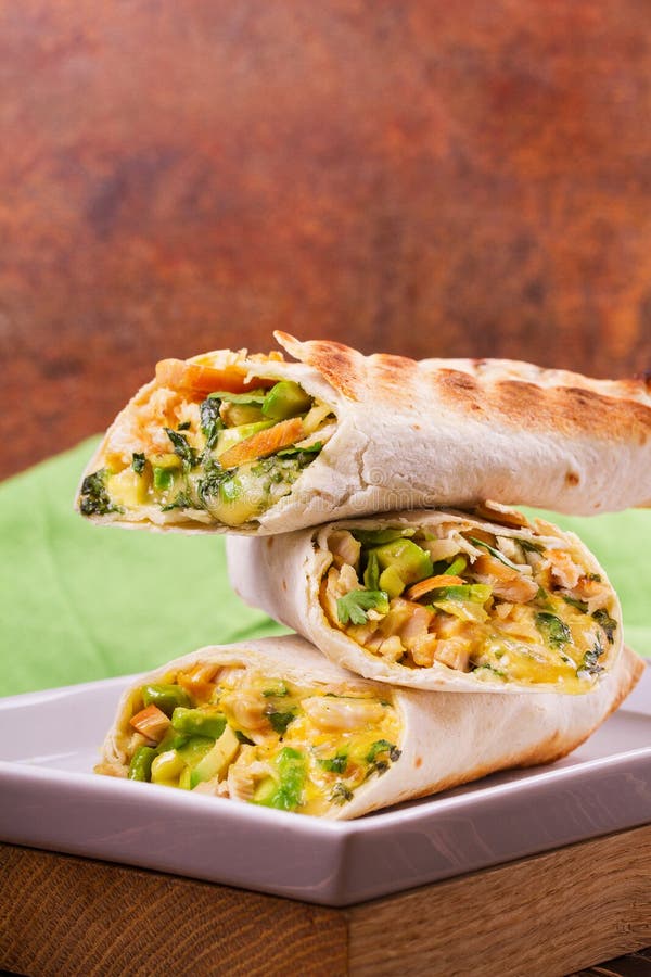 Wraps with Chicken, Avocado, Cilantro and Cheese. Chicken Burrito