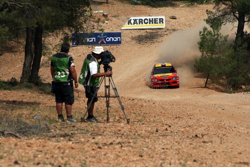 A trail of dust left behind by the race car at the WRC 55th Acropolis Rally 2008 in Greece. A trail of dust left behind by the race car at the WRC 55th Acropolis Rally 2008 in Greece.