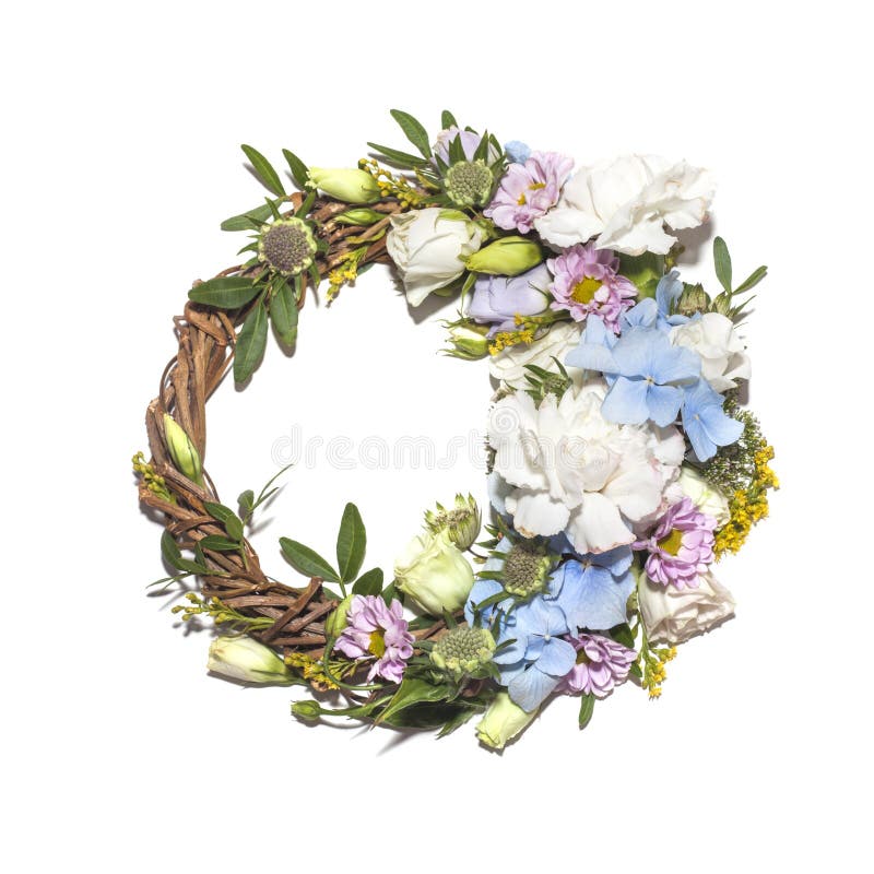 Wreath of defferent flowers isolated on a white background. Wreath of defferent flowers isolated on a white background
