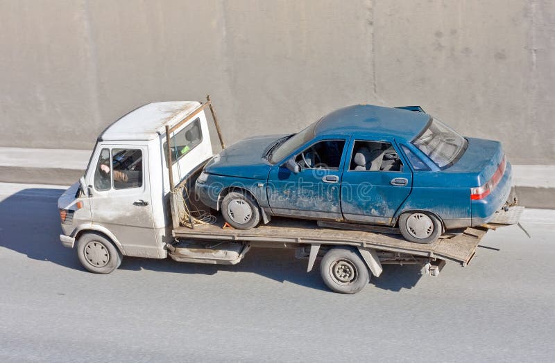 Wreck car carrier truck deliver damaged car royalty free stock photos Wreck car carrier truck deliver damaged car royalty free stock photos