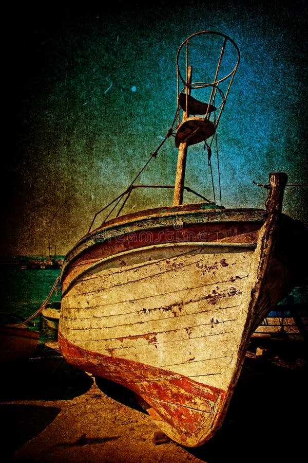 Wreck of rusty antique boat in grunge style