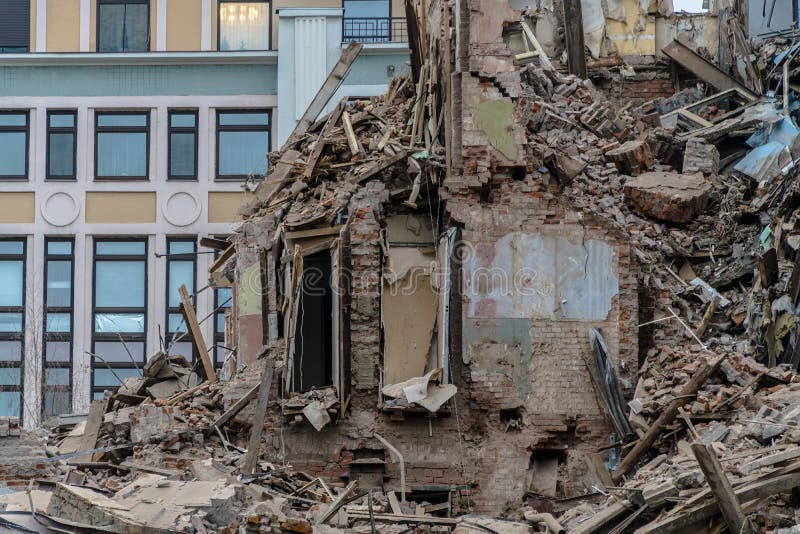 The wreckage and the skeleton of an old building destroyed to make room for modern development royalty free stock photography