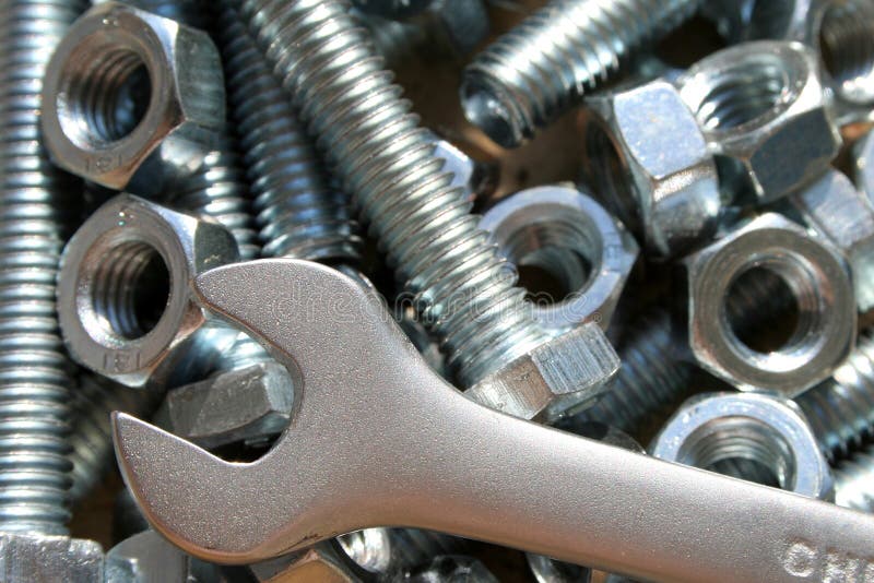 Wrench,nuts and Bolts on a Gray Background.items for Mounting Details