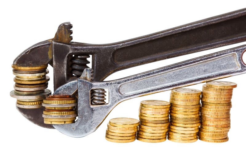 Wrenchs and coins royalty free stock image