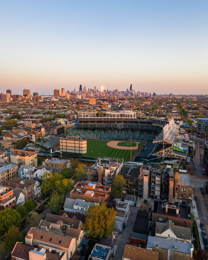 Wrigley Field at Sunset. City Skyline in Background