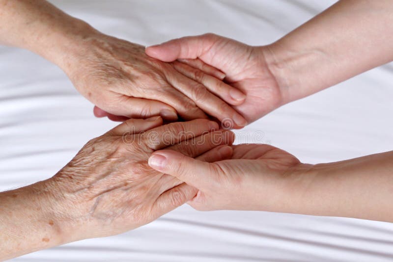 Female hands closeup, concept of care and support, elderly mother and daughter. Female hands closeup, concept of care and support, elderly mother and daughter