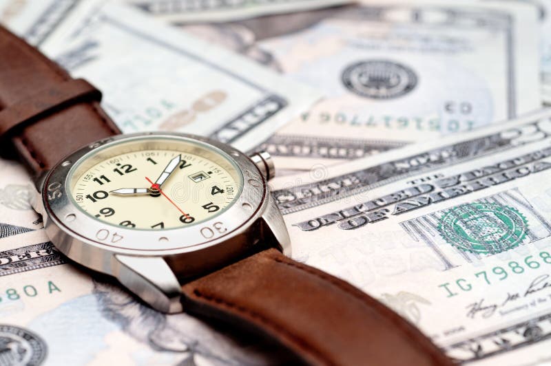 A wristwatch on American currency