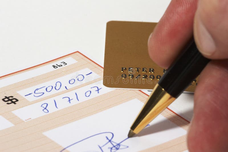 Writing a bank check stock photo. Image of cheque, hand 1761998