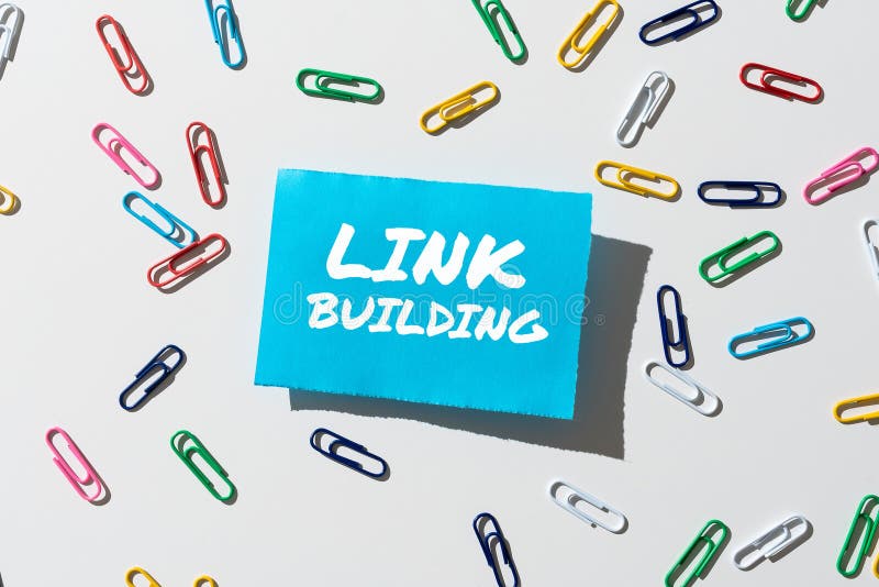Writing displaying text Link Building. Business concept Process of acquiring hyperlinks from other websites Connection. Handwriting text Link Building, Business concept Process of acquiring hyperlinks from other websites Connection Piece Of Paper With Important Message Surrounded By Colorful Paperclips.