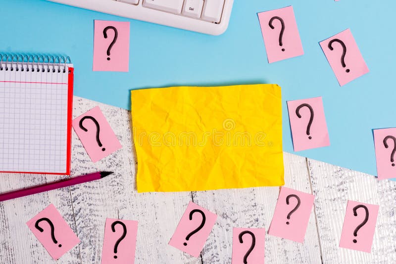 Writing Equipment and Computer Stuff Plus Scribbled Paper Placed on a