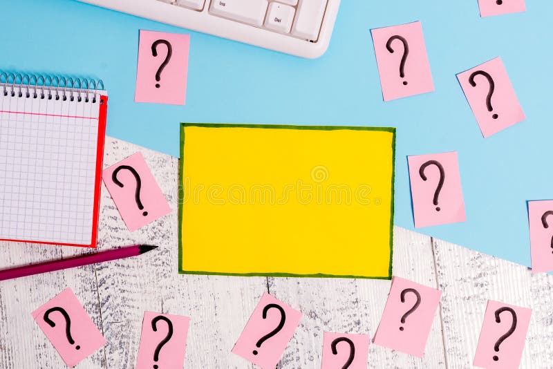 Writing Equipment and Computer Stuff Plus Scribbled Paper Placed on a