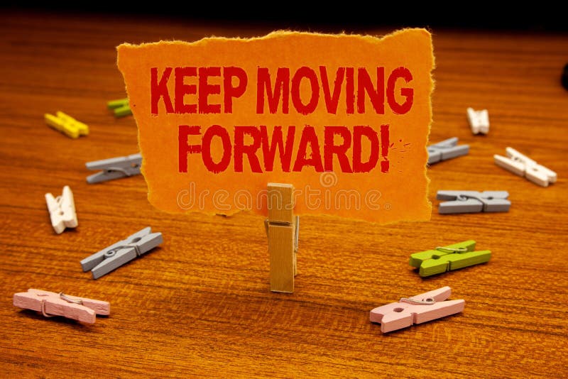 Writing note showing Keep Moving Forward Motivational Call. Business photo showcasing Optimism Progress Persevere Move Paperclip. Holding orange page show red stock image Writing note showing Keep Moving Forward Motivational Call. Business photo showcasing Optimism Progress Persevere Move Paperclip. Holding orange page show red stock image