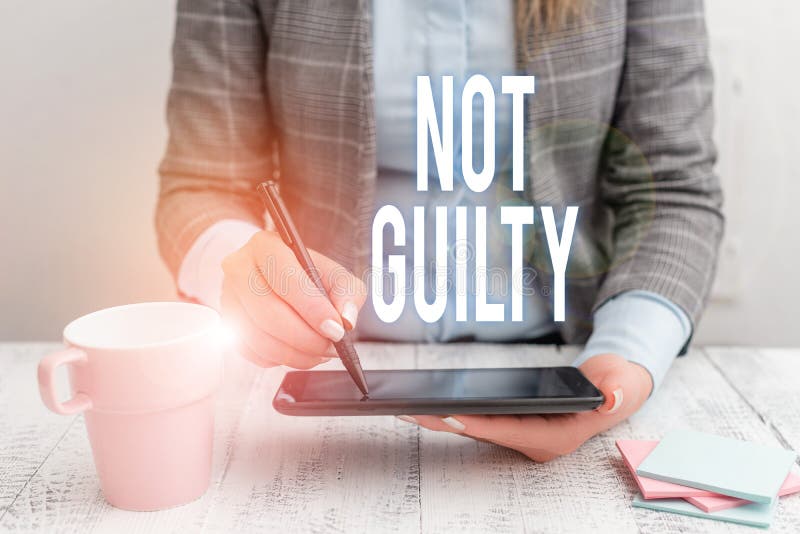 Writing note showing Not Guilty. Business photo showcasing someone is innocent didnt commit specific crime He free royalty free stock photos Writing note showing Not Guilty. Business photo showcasing someone is innocent didnt commit specific crime He free royalty free stock photos