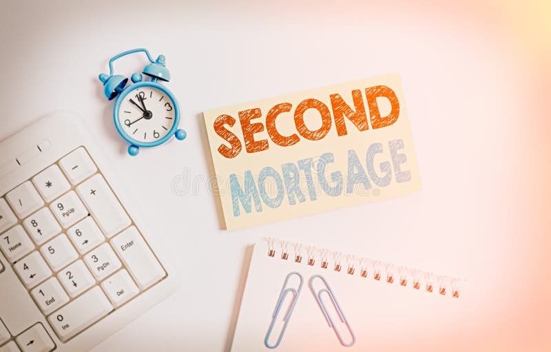 Writing note showing Second Mortgage. Business photo showcasing lien on property which is subordinate to more senior one Keyboard