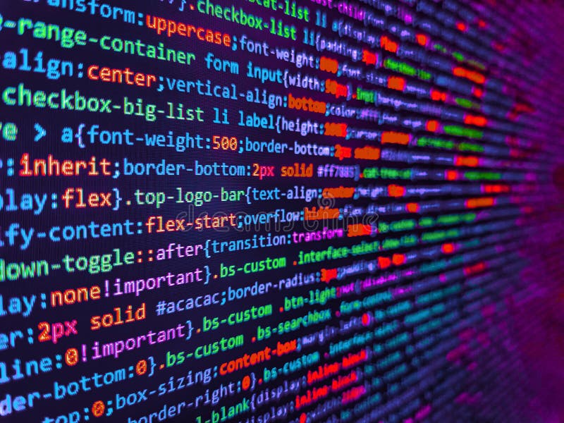 Writing programming functions on laptop. Minificated web development javascript code close up in sunset rays. Application web royalty free stock photos