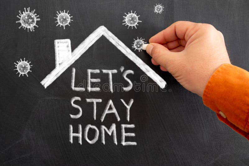 Writing stay at home to a chalkboard for announcing to keep social distance to avoiding from the golbal pandemic. Corona stock image Writing stay at home to a chalkboard for announcing to keep social distance to avoiding from the golbal pandemic. Corona stock image