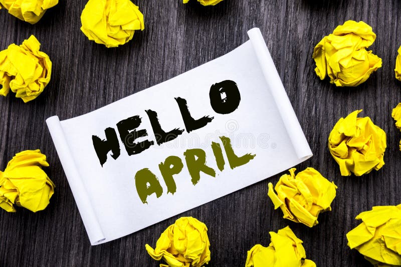 Writing text showing Hello April. Business concept for Spring Welcome Written on sticky note notepad note notebook book wooden bac royalty free stock image Writing text showing Hello April. Business concept for Spring Welcome Written on sticky note notepad note notebook book wooden bac royalty free stock image