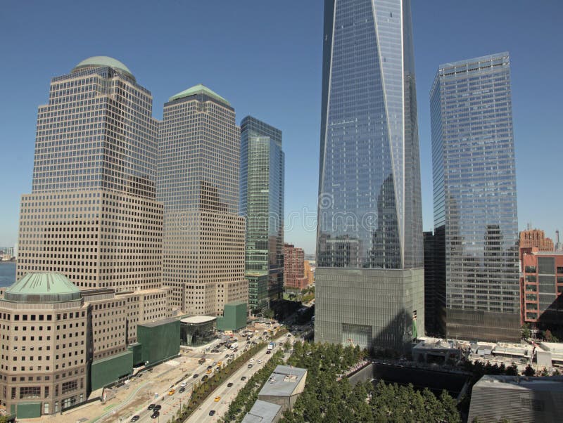 One World Trade Center,in center, surrounded by buildings comprising the Financial District of NYC. One World Trade Center,in center, surrounded by buildings comprising the Financial District of NYC.