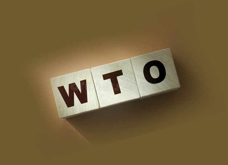 WTO text on wooden cubes. World Trade Organization. Business concept