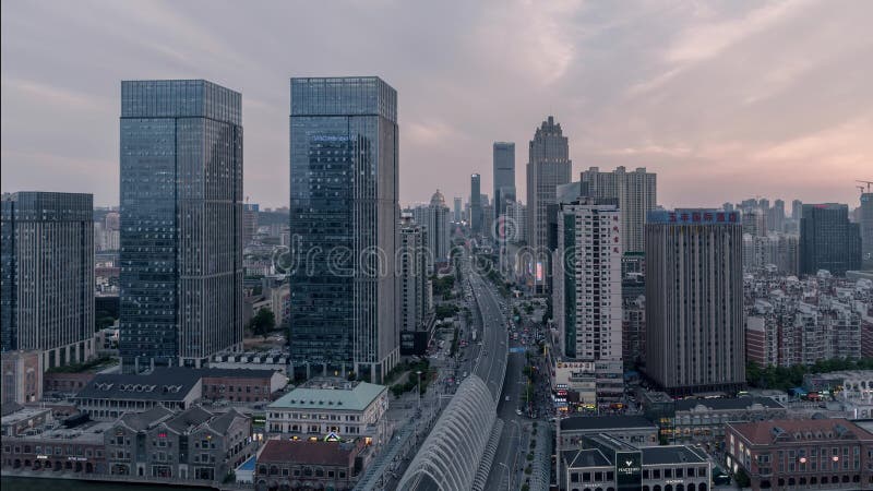 Wuhan China urban modern city skyline landscape timelapse twilight sunset