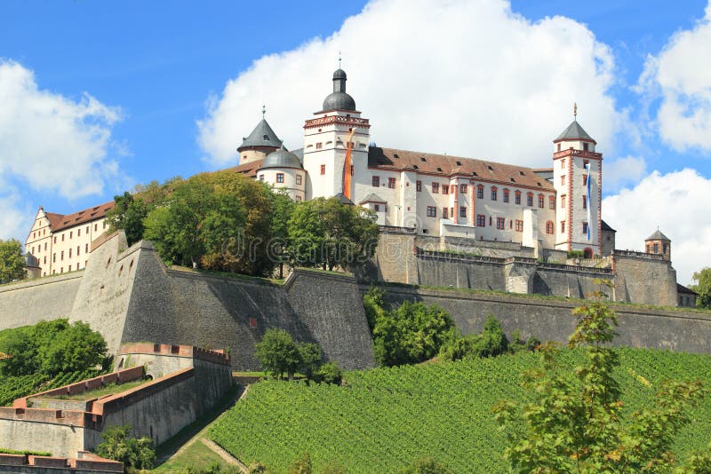The fortress Marienberg in Wurzburg with the surrounding vineyards, Germany. The fortress Marienberg in Wurzburg with the surrounding vineyards, Germany.