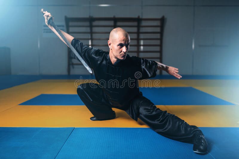 Master Of Martial Arts Has An Advanced Optical Brain Wushu Master Training with Sword, Martial Arts Stock Image - Image of