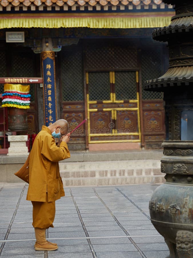 Buddist monk in Wutai Mountain temple, Shanxi, China royalty free stock photo