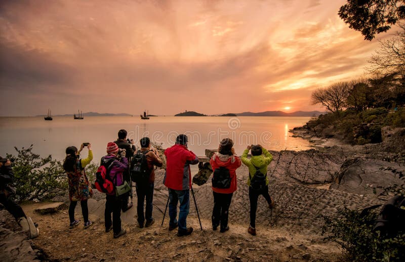 Photographers take Taihu sunset at the Turtle Head Islet Park. stock image Photographers take Taihu sunset at the Turtle Head Islet Park. stock image