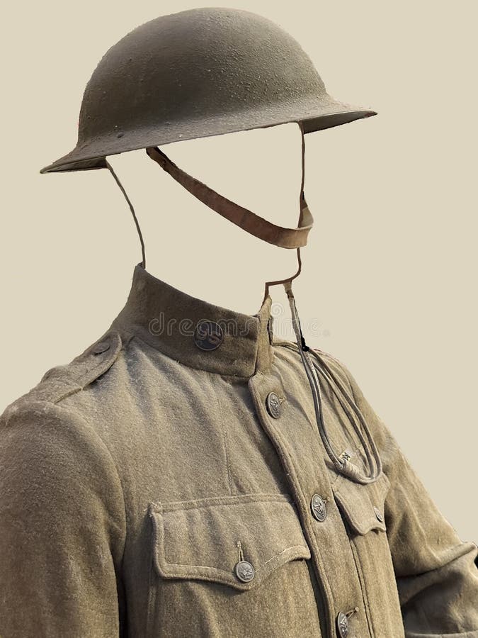 WWI American army uniform is isolated with torso and hat. You see the helmet,chin strap,collar,lapel,buttons and pockets. Soldier wore outfit in WWI. WWI American army uniform is isolated with torso and hat. You see the helmet,chin strap,collar,lapel,buttons and pockets. Soldier wore outfit in WWI.