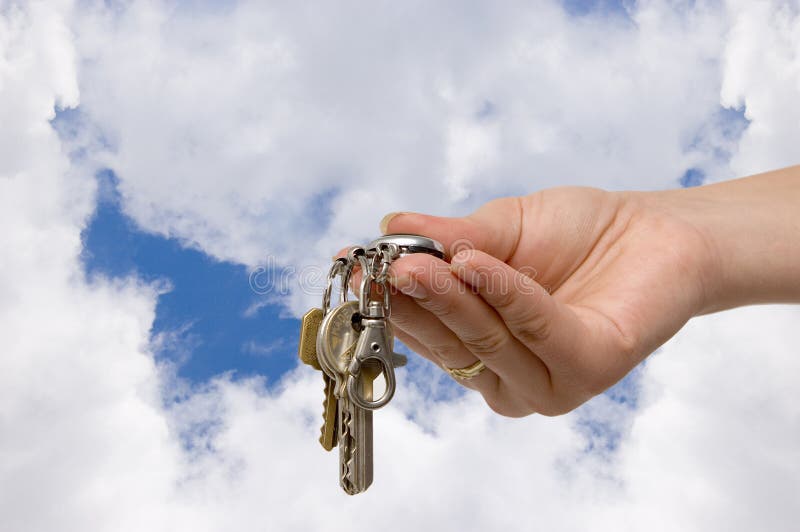 Woman hold in hand a bunch of keys. Woman hold in hand a bunch of keys