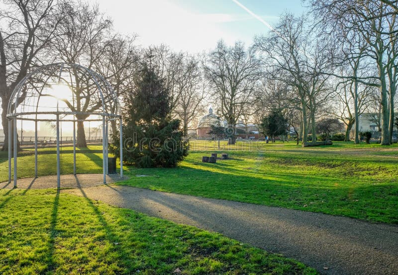 Taken on a bright winter& x27;s day with a blue sky and sunlight shining through the arbour. Taken on a bright winter& x27;s day with a blue sky and sunlight shining through the arbour.