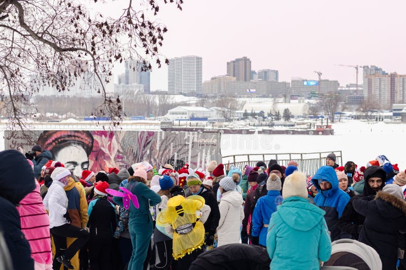 Race on January 1 in New Year&#x27;s costumes running club Novosibirsk 01.01.2024 Running people in winter photo. Race on January 1 in New Year&#x27;s costumes running club Novosibirsk 01.01.2024 Running people in winter photo