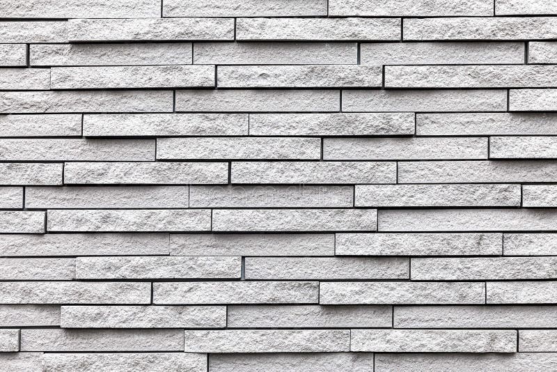 Wzór warstwy muru z białej okładziny kamiennej i bezszwowe tło