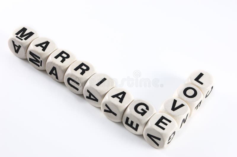 Two Words, love and marriage arranged together with game letter cubes (boggle). Focus is on the letter 'O'. Two Words, love and marriage arranged together with game letter cubes (boggle). Focus is on the letter 'O'.