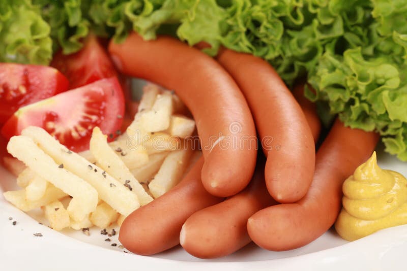 Würste und Pommes-Frites stockfotografie Würste und Pommes-Frites stockfotografie