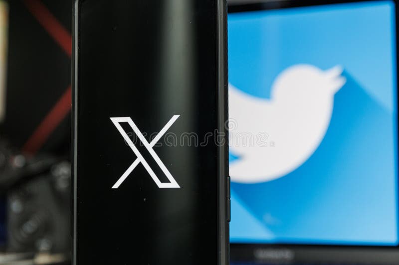 X logo and the twitter logo on the screen.