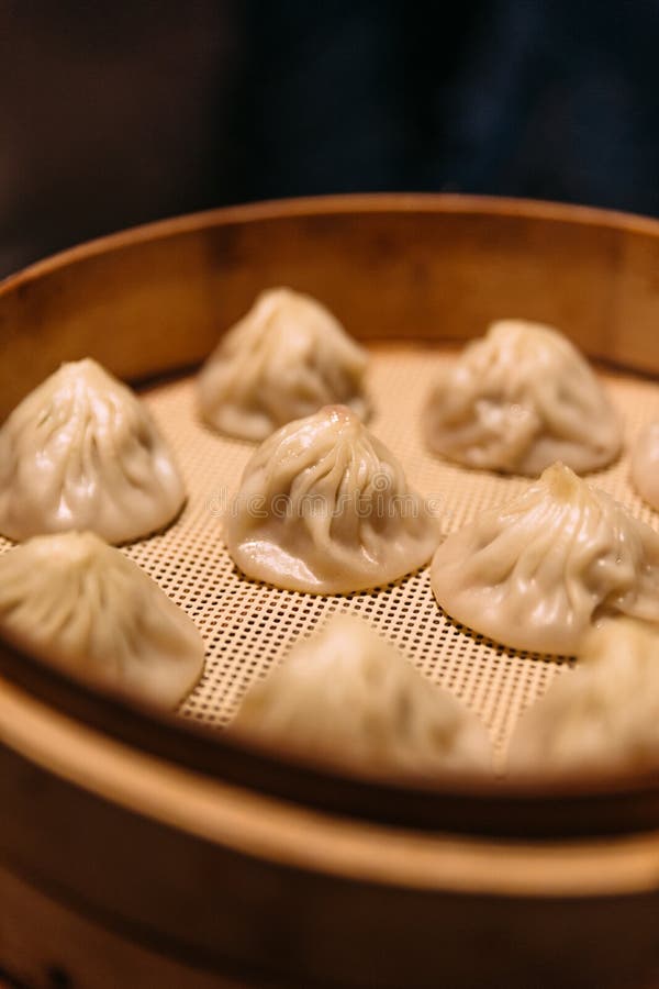 Steamed Xiao Long Bao Soup Dumplings in the Bamboo Basket. Served in ...