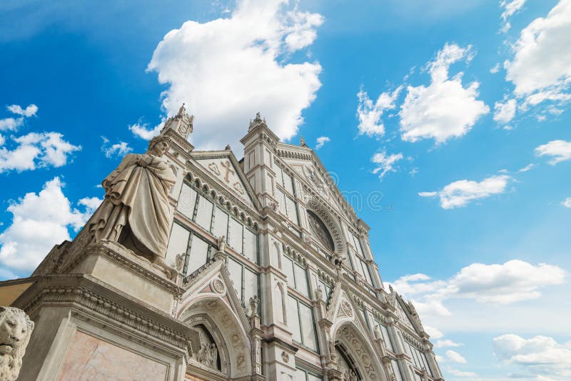 XIX century Dante Alighieri statue and Santa Croce cathedral in Florence, Italy. XIX century Dante Alighieri statue and Santa Croce cathedral in Florence, Italy