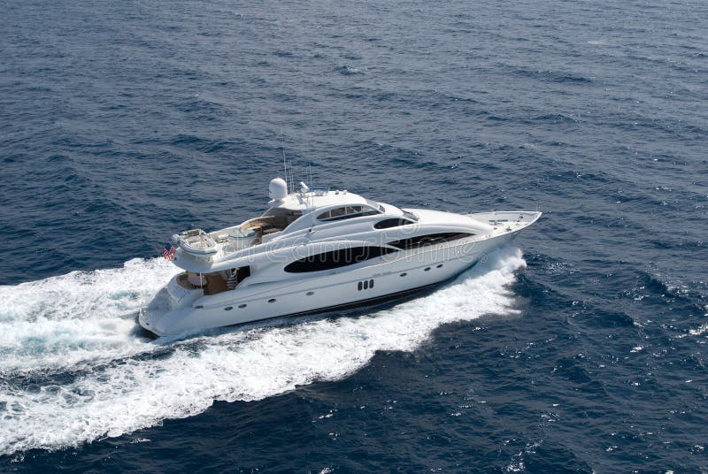 Top view of luxury yacht cruising in the ocean. Top view of luxury yacht cruising in the ocean