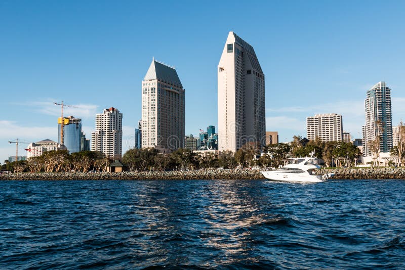 A Yacht Passes by the Downtown San Diego Skyline royalty free stock images A Yacht Passes by the Downtown San Diego Skyline royalty free stock images
