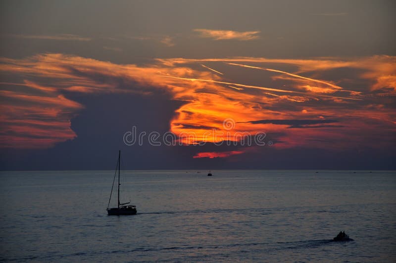 A yacht sailing on the sea stock photo A yacht sailing on the sea stock photo