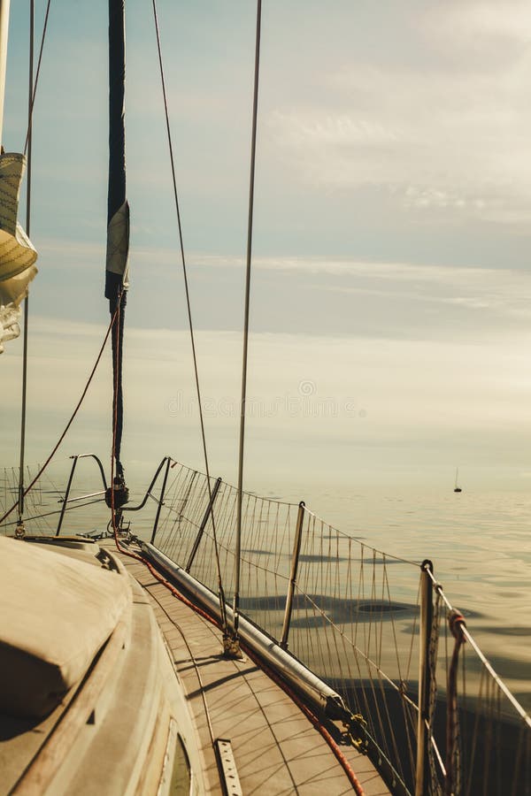 Yachting on sail boat during sunny weather