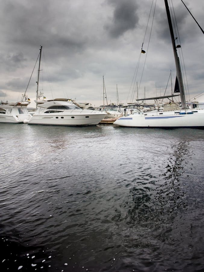 two yachts leave from harbour h