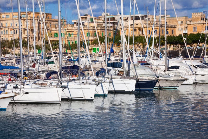 Yachts lying at Marsamxett harbour stock photos
