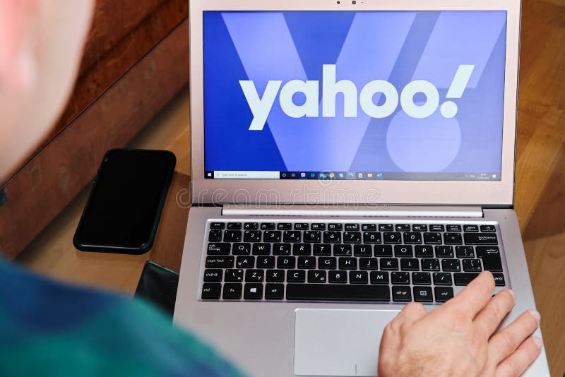 Yahoo is used for business meeting on laptop by man. An illustrative editorial image. San Francisco, US, June 2020.