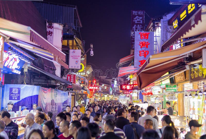 YANGSHOU CHINA - NOVEMBER 9, 20167: West street is a main commercial street with restaurants bars and gift shops. YANGSHOU CHINA - NOVEMBER 9, 20167: West street is a main commercial street with restaurants bars and gift shops.