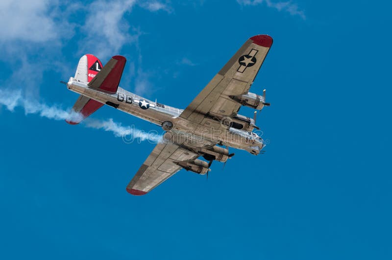 EDEN PRAIRIE, MN - JULY 16 2016: B-17G bomber Yankee Lady flies to right overhead at air show. This B-17 was a Flying Fortress built for use during World War II but never flew in any combat missions.